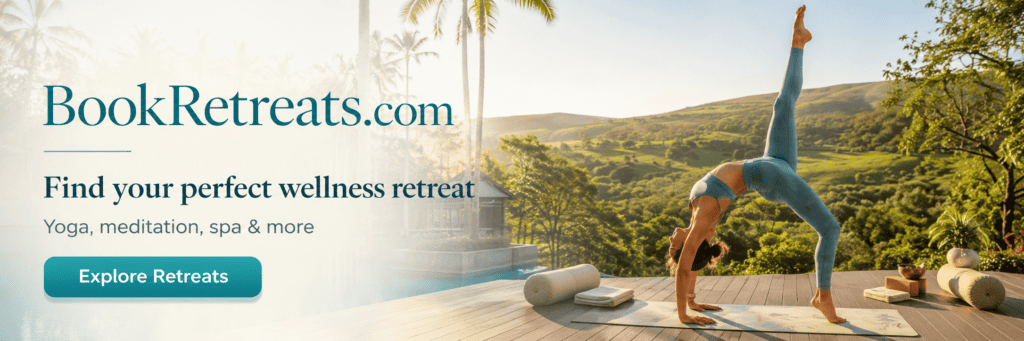 BookRetreats.com affiliate banner featuring a woman practicing yoga at a scenic tropical wellness retreat, with the text “Find your perfect wellness retreat” and an “Explore Retreats” call-to-action button.